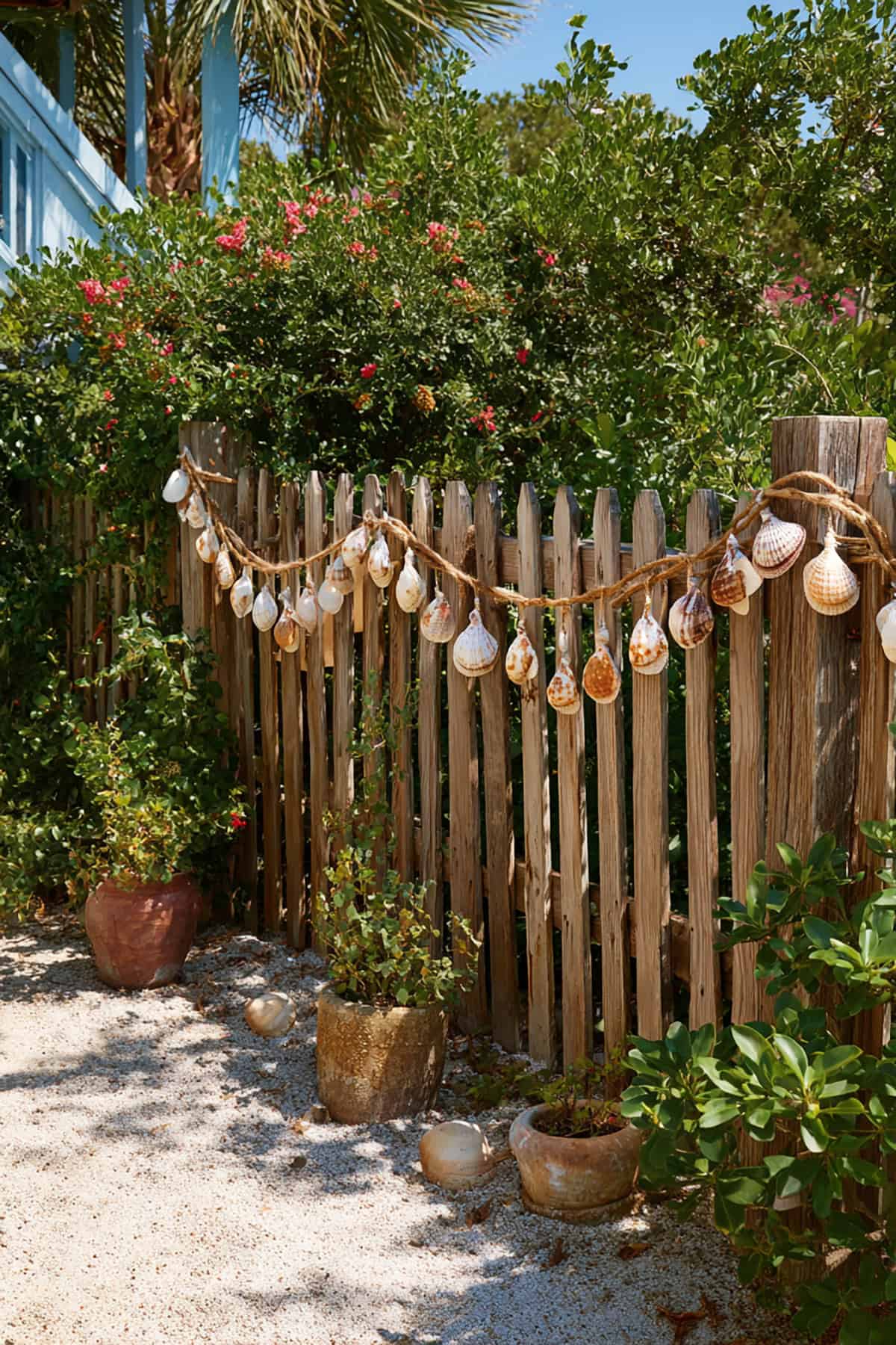 Fence Decorated with Shell Garlands