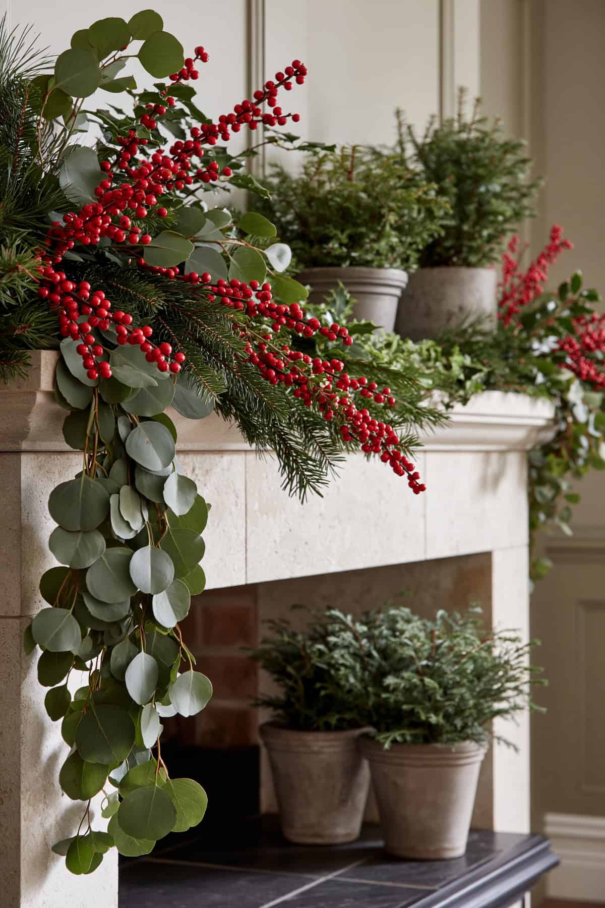 Cascading Eucalyptus Mantel With Red Berries