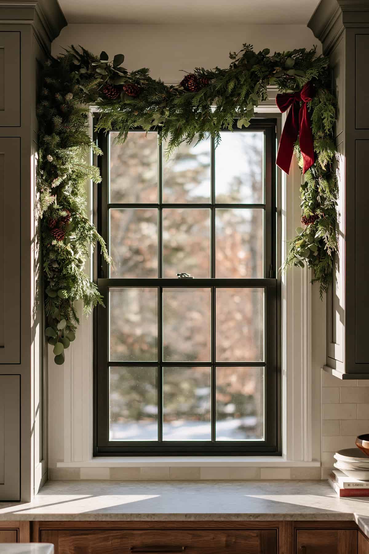Cedar Garland Draped Across A Kitchen Window