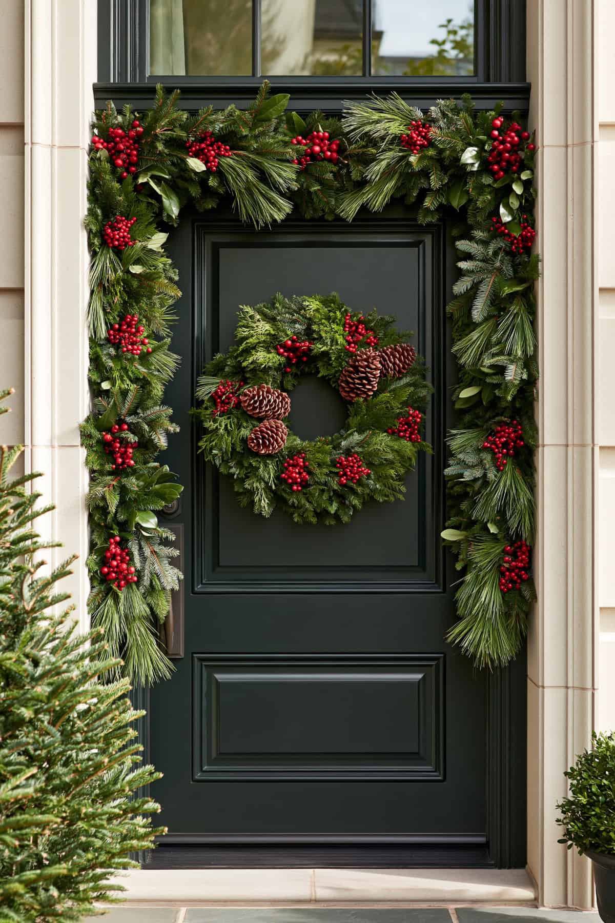 Fresh Greenery Wrapped Around A Front Door