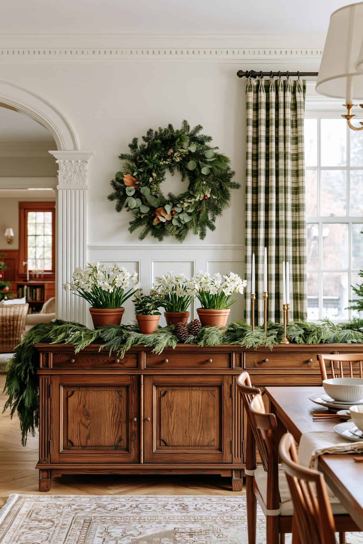 Garland Draped Over A Dining Room Sideboard