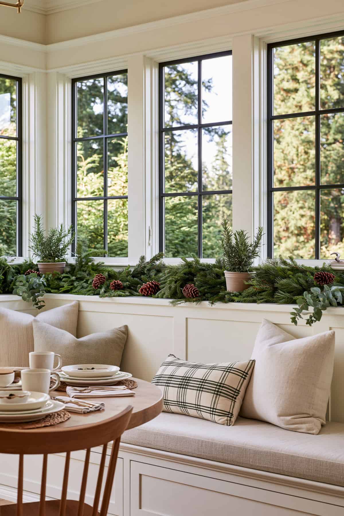 Greenery Garland Across A Breakfast Nook Bench
